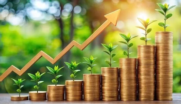 Coins stacking higher with trees growing out of them, symbolizing the growth potential and financial prosperity associated with Indexed Universal Life Insurance.