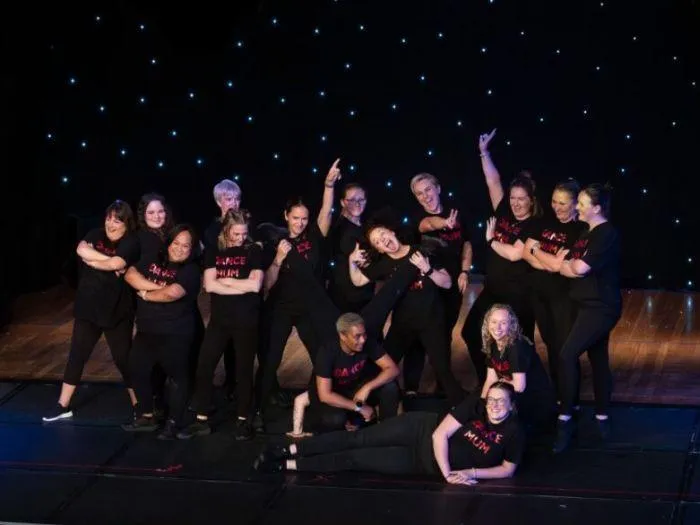 Dance Mums group bringing joy and energy to the 2024 MGA stage, celebrating confidence and fun through movement.