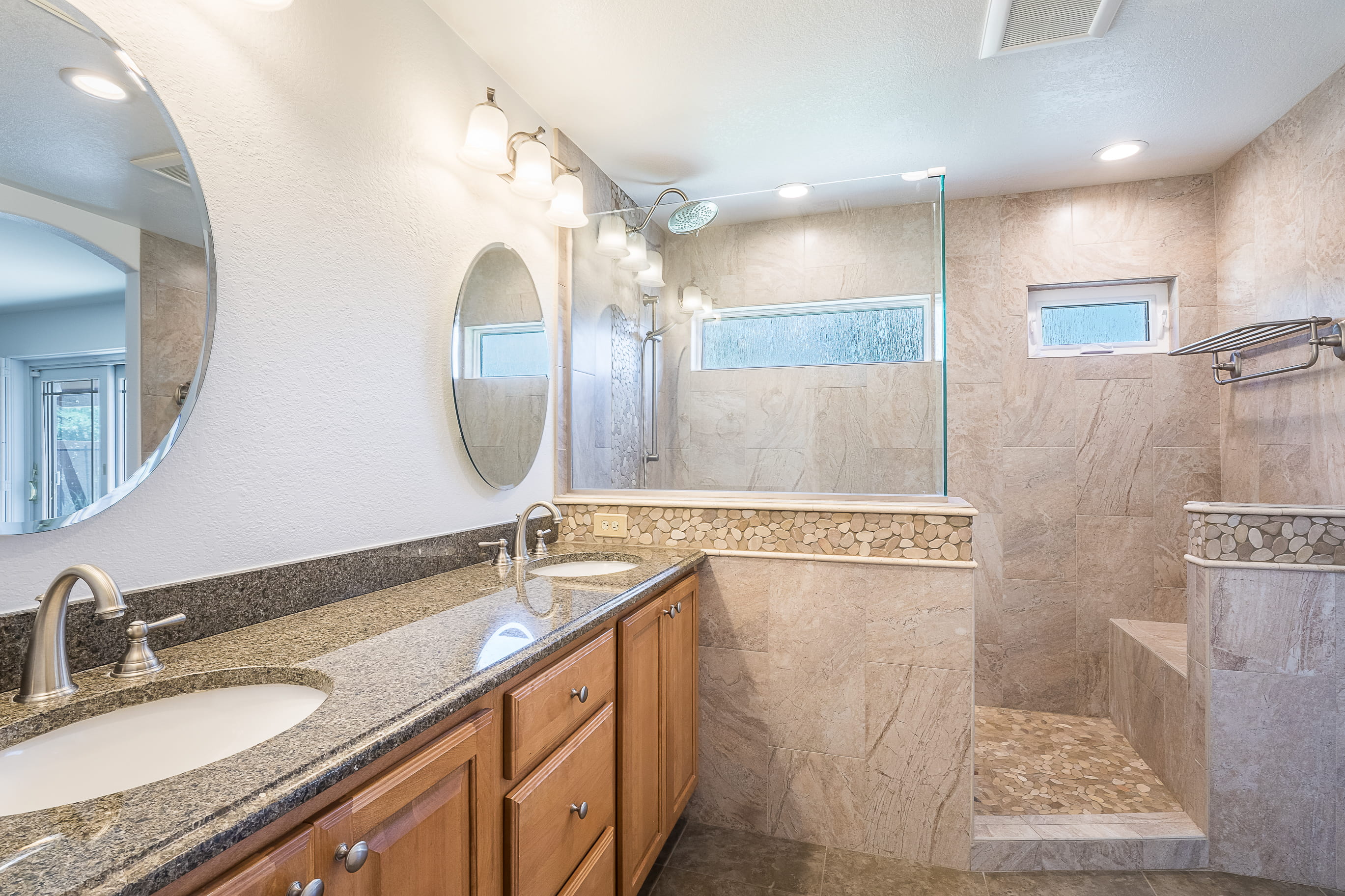 Granite counters and tile bathroom