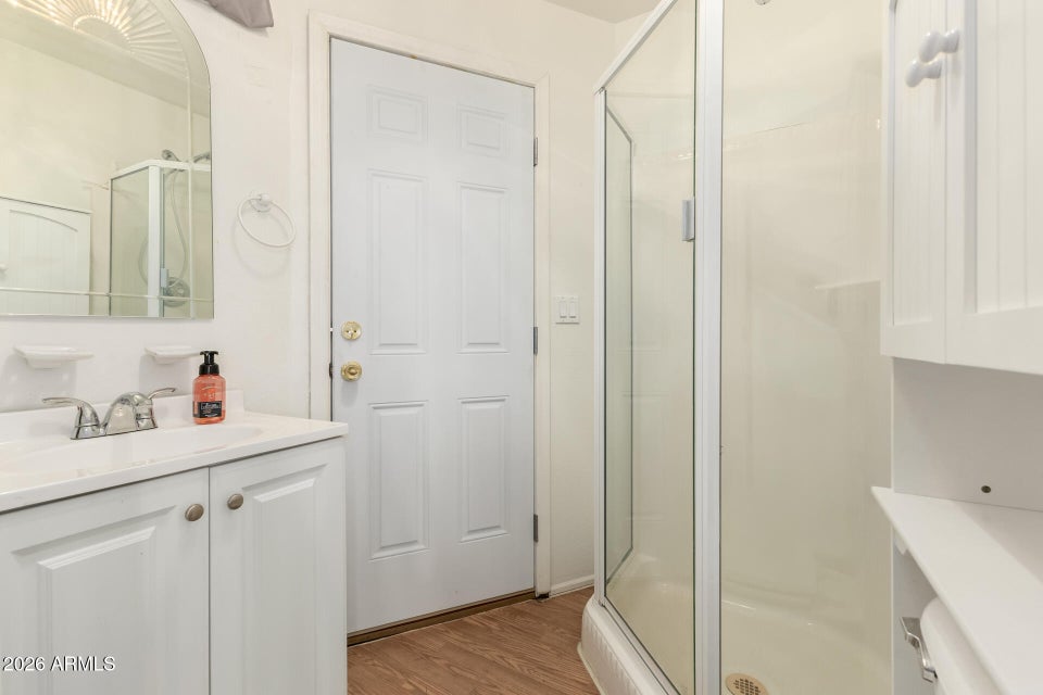 White bathroom with glass shower