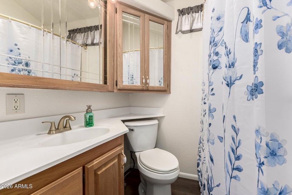 bathroom with white counter top