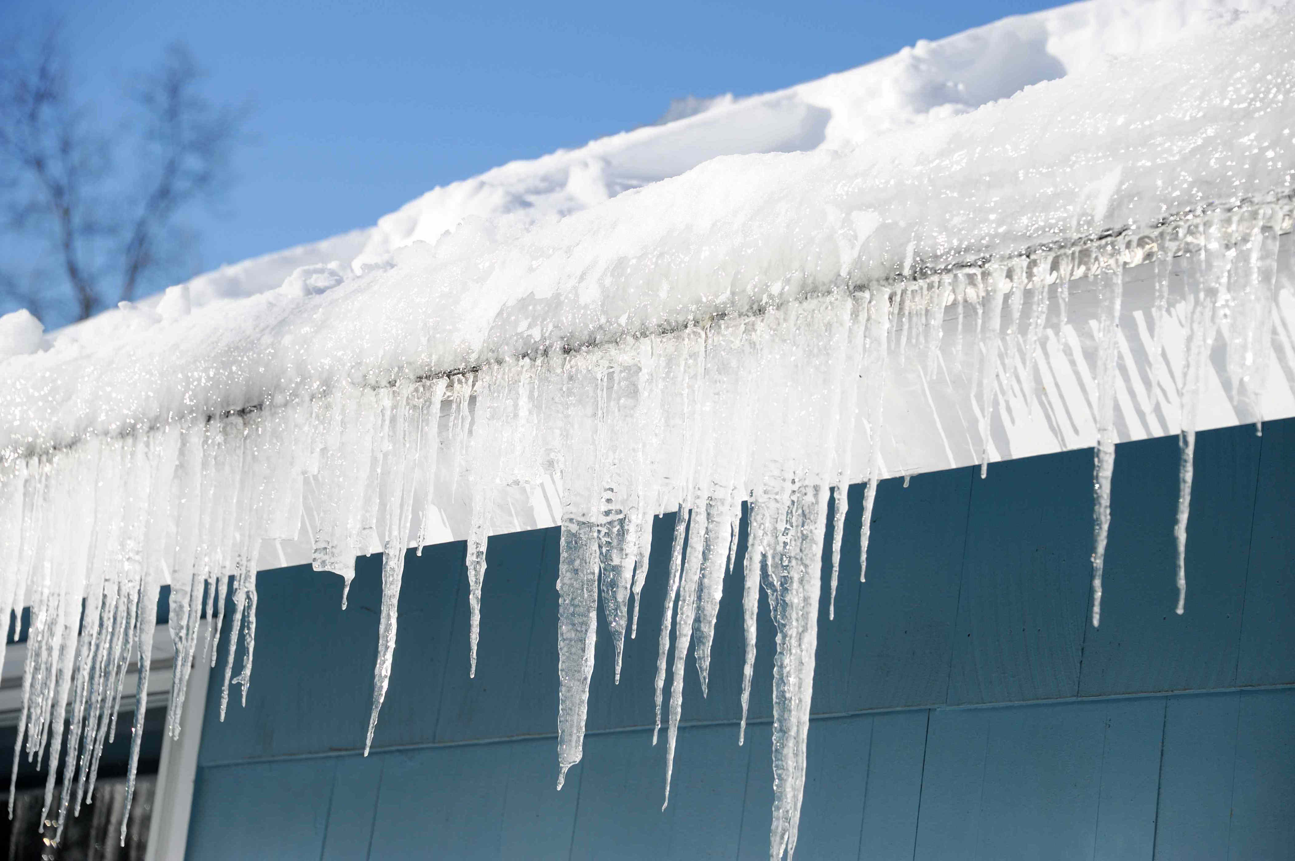 Ice dam removal from residential roof in La Crosse Wisconsin