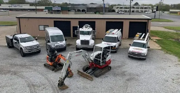 C Mac Plumbing office and service trucks in Oxford AL