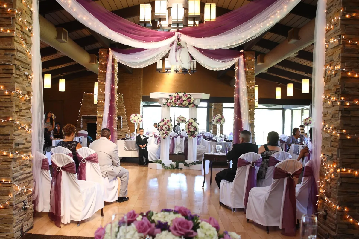 A woman standing on one leg on a beach