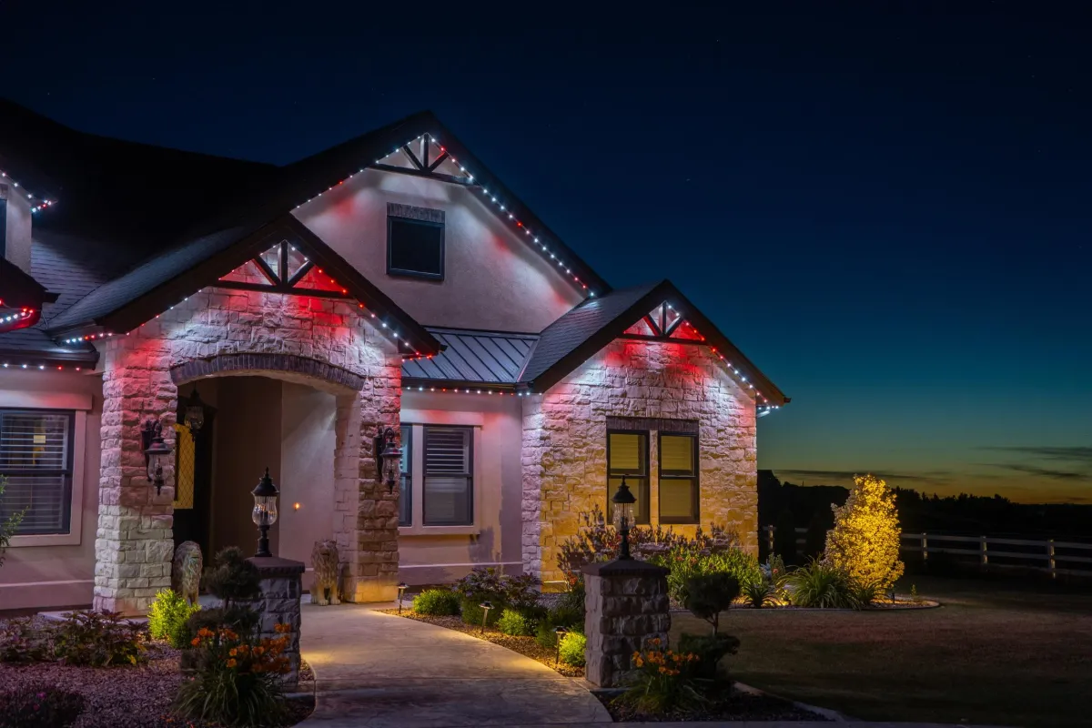 Home exterior with full-color architectural lighting