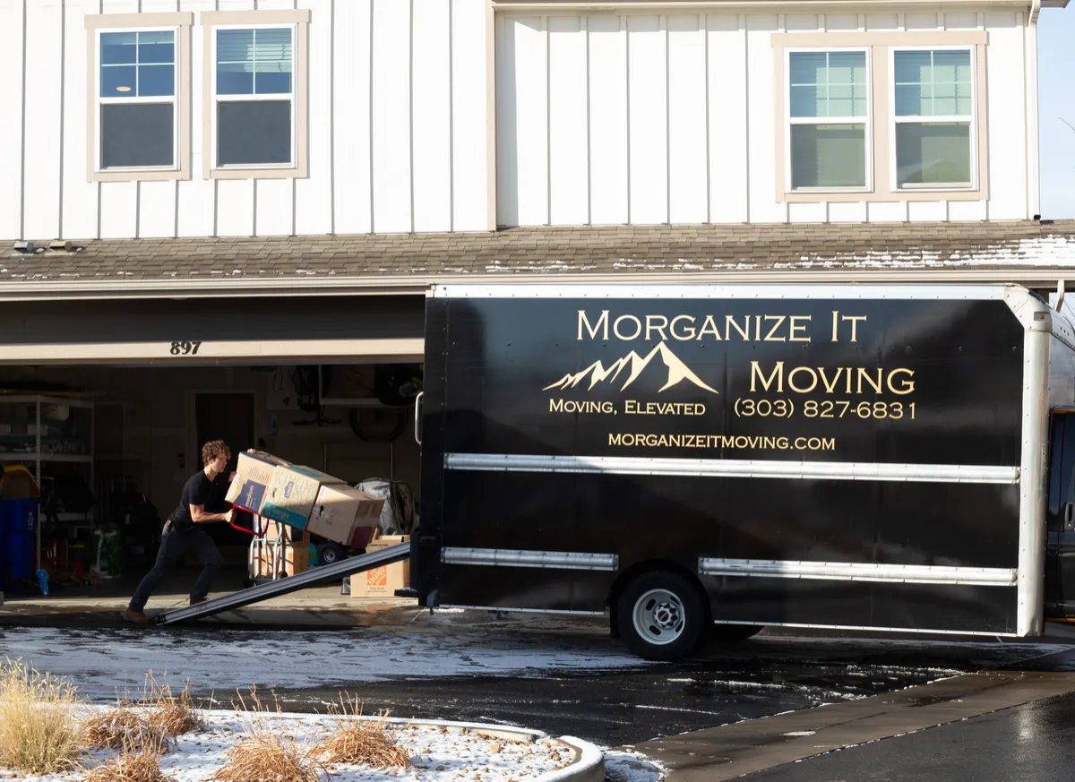 Photo of truck being loaded with boxes