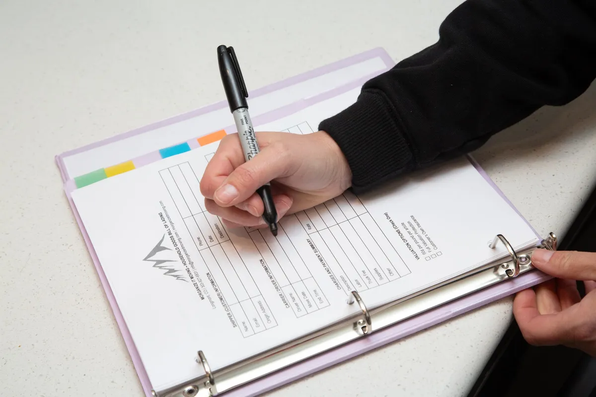 Photo of a bill of lading being signed