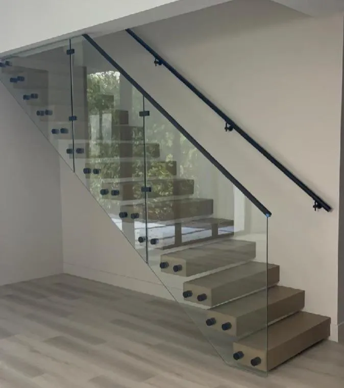 A single red rose with water droplets