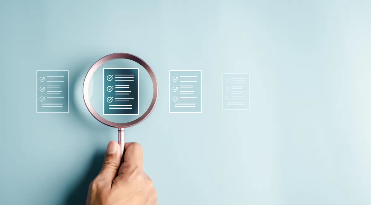 magnifying glass over document