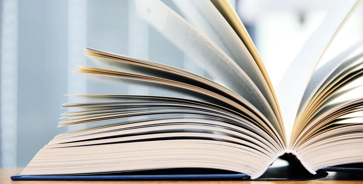 book laying on table open