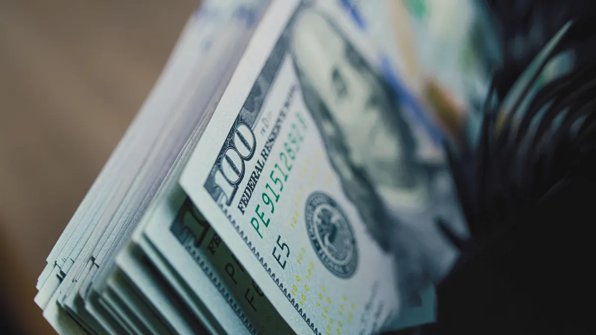 stack of 100 dollar bills