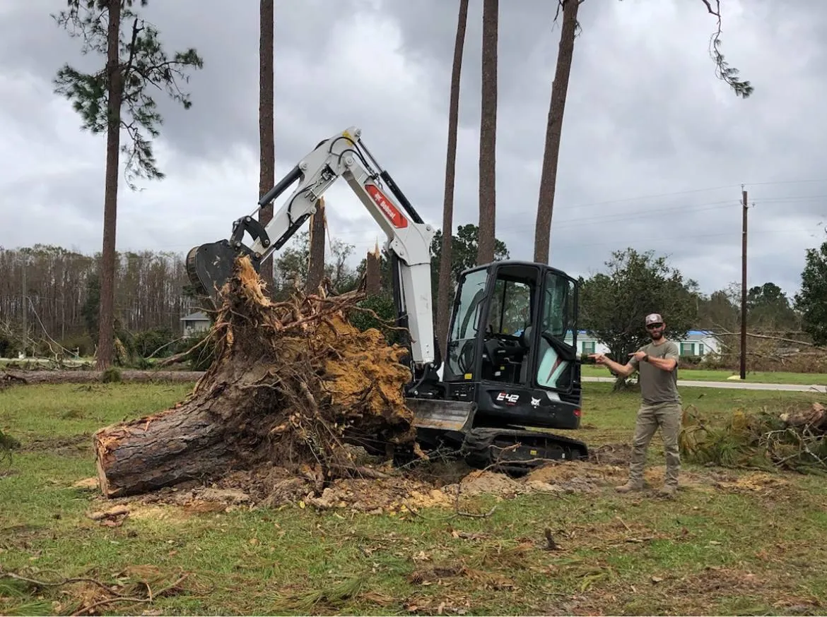 man under tree during daytime