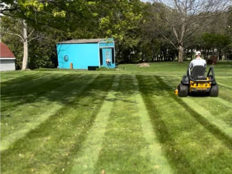 Lawn mowing service in Tiffin Iowa providing clean even cuts and professional lawn maintenance