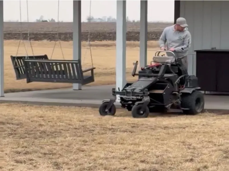 Lawn fertilization service in Columbus Junction Iowa promoting healthy green grass growth