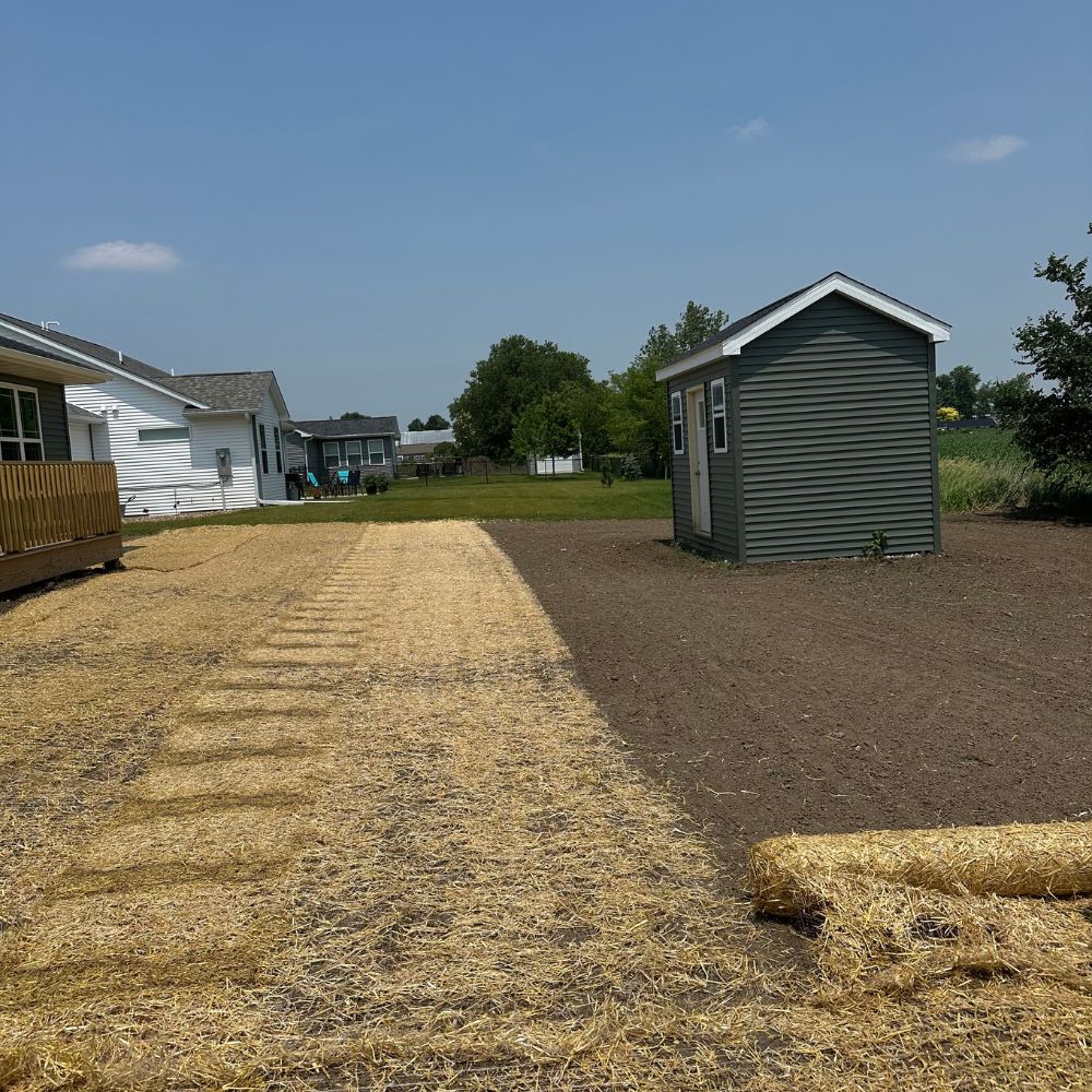 Lawn seeding in Mt Pleasant Iowa for large residential property lawn improvement