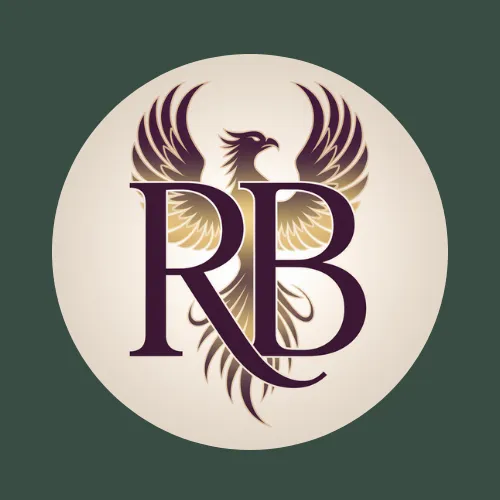 Brand logo for Baz Porter RB logo featuring a regal phoenix in gold and plum tones—icon of elite transformation, emotional mastery, and visionary leadership