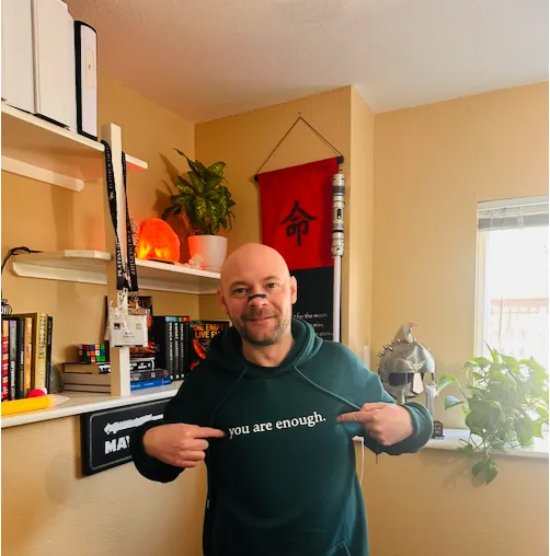 Baz Porter, leadership authority and creator of the Sovereign Leadership framework, photographed outdoors in natural light, representing calm decision-making, emotional mastery, and embodied executive presence.