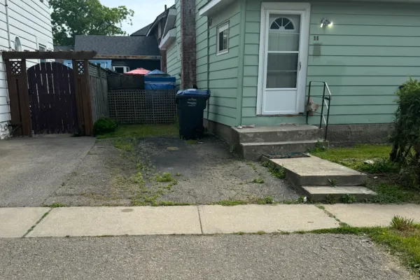 Cracked asphalt driveway extension