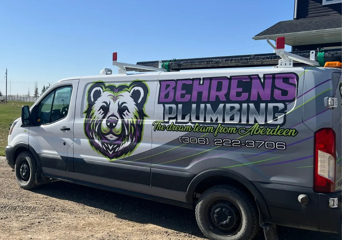 Crew in front of plumbing van