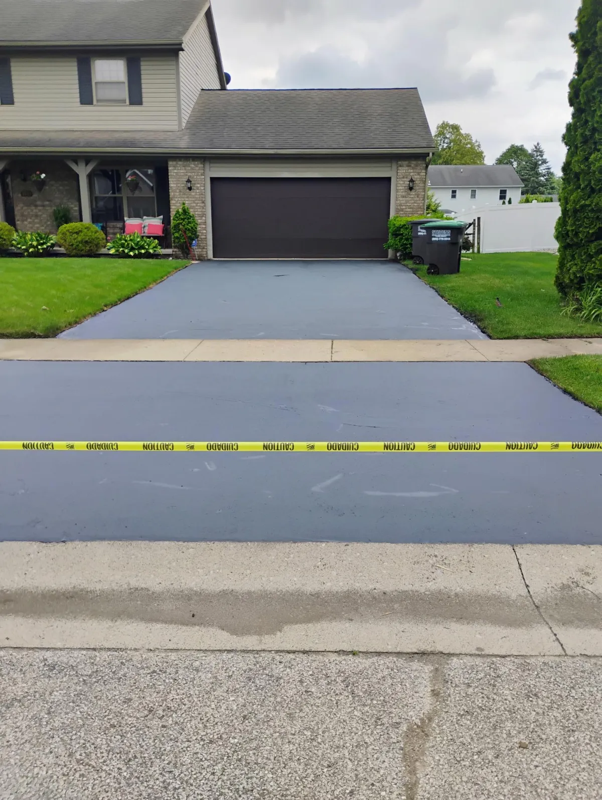 Professional asphalt repair in Toledo, Ohio by Sommer’s Sealcoating – fixing driveway cracks and restoring smooth pavement surface