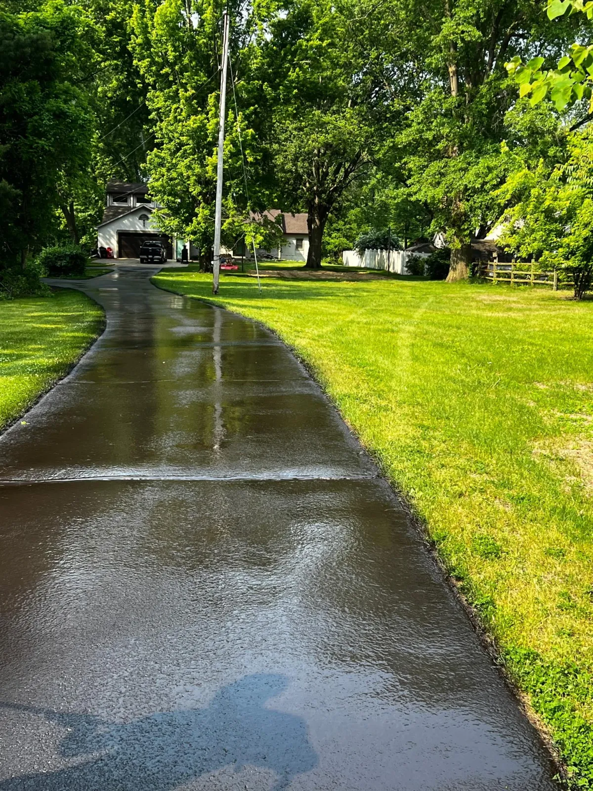 Professional asphalt repair in Toledo, Ohio by Sommer’s Sealcoating – fixing driveway cracks and restoring smooth pavement surface