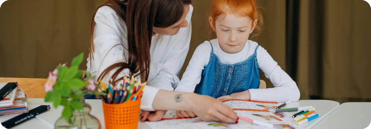 Mom tutoring her daughter