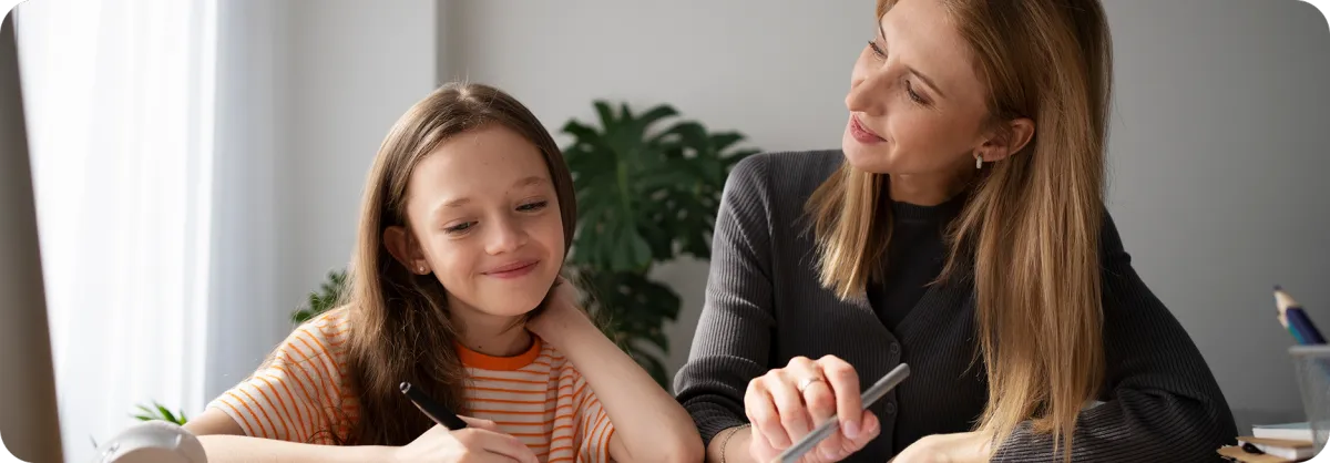 Mom tutoring her daughter