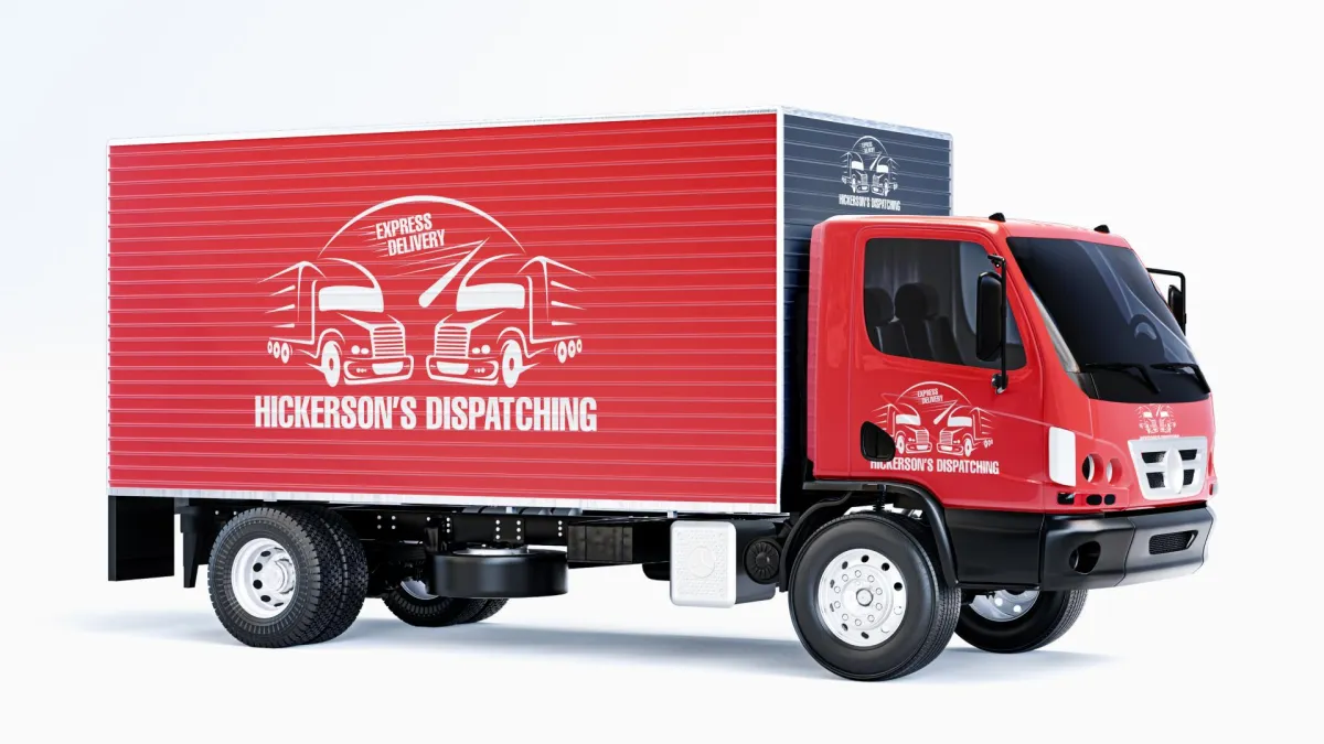 A red truck featuring a logo on its side, parked in a sunny outdoor setting.