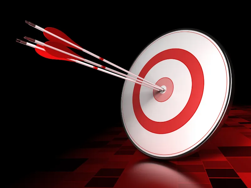 A red and white target with two arrows striking the center, symbolizing precision and focus.