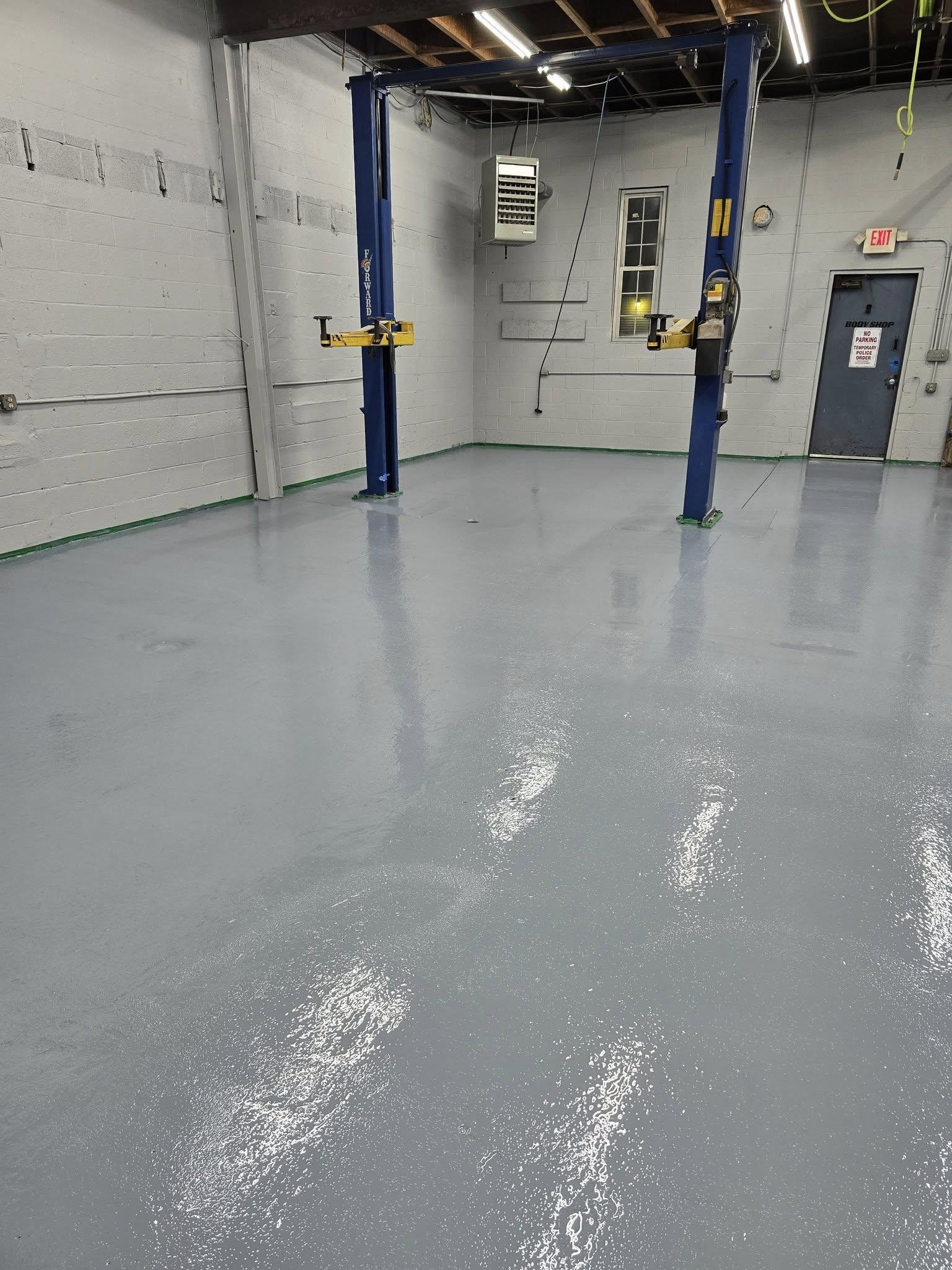 Photorealistic epoxy garage floor coating, residential installation