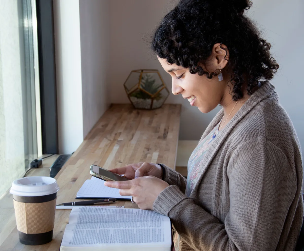 silhouette of boy riding bicycle in wheelie during golden hour