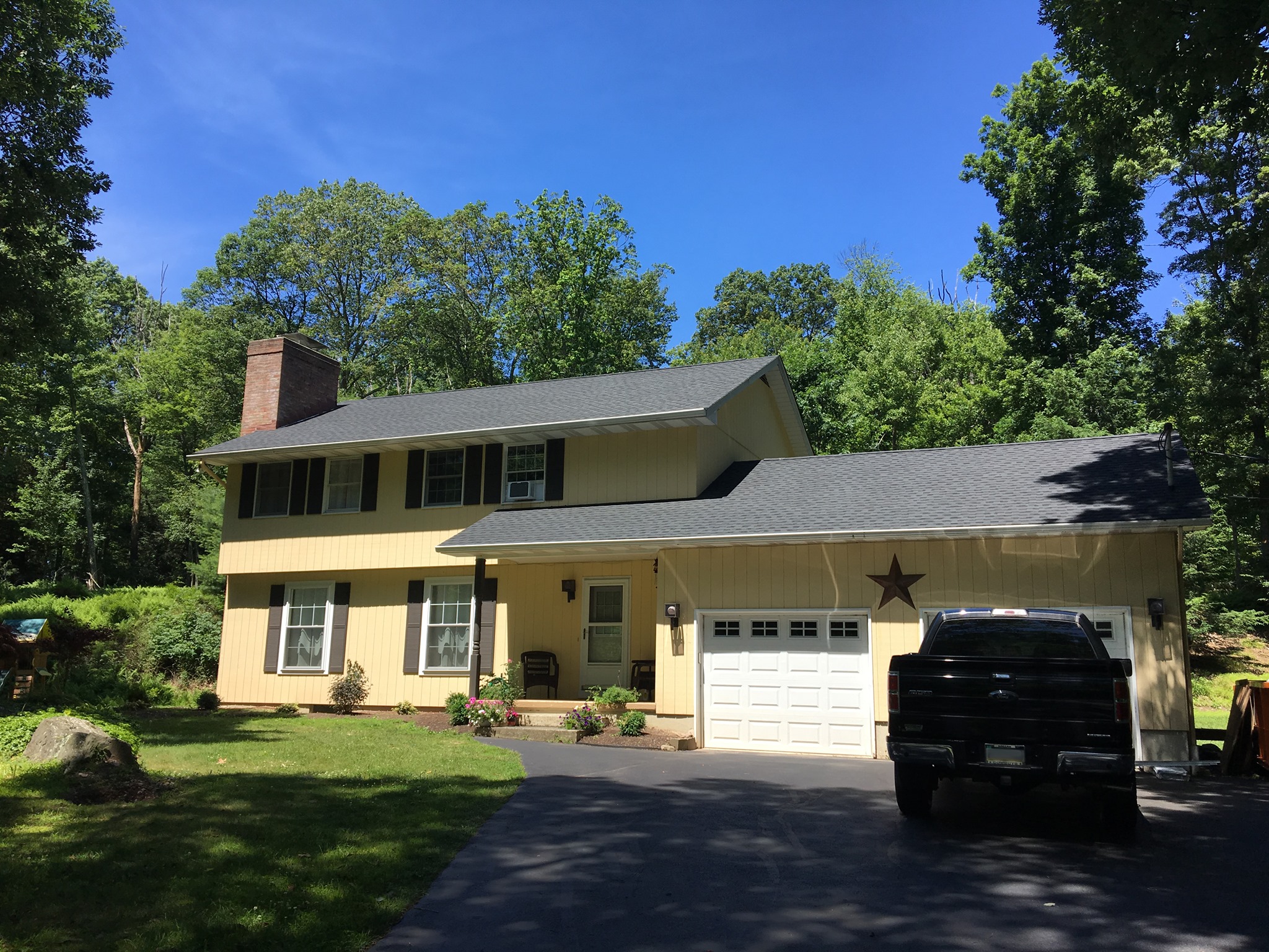 a roof with a few shingles
