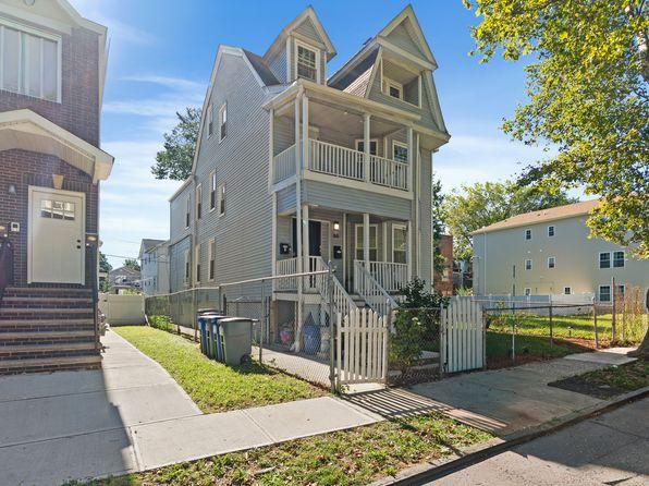 rooftop composite deck with cable railing on duplex in Greenwood East Orange