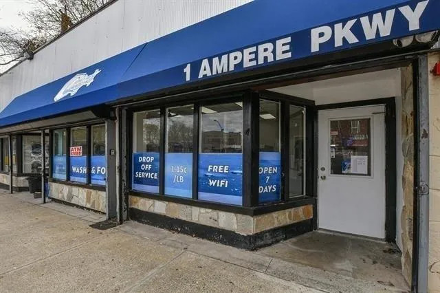narrow cedar deck with privacy screen behind home in Ampere East Orange NJ