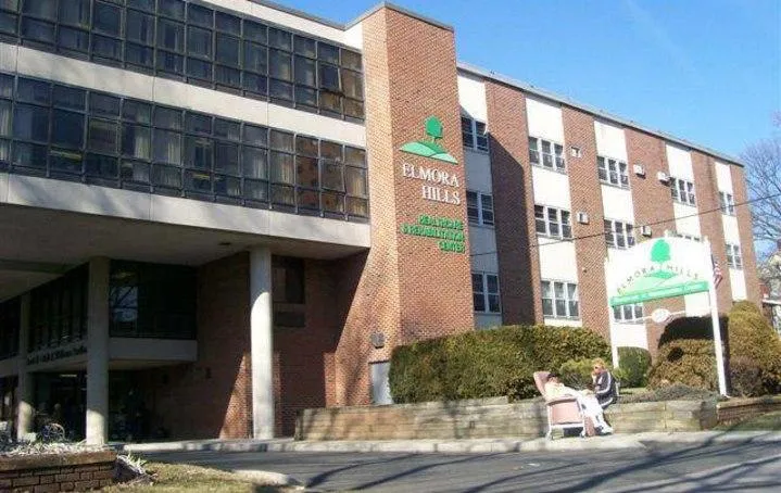 cedar deck with decorative railing behind colonial-style home in Elmora Hills Elizabeth NJ