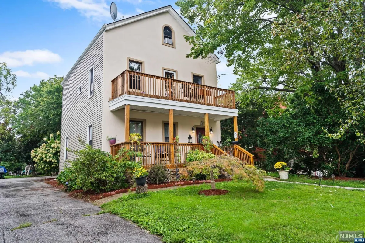 rooftop deck with railing and lounge furniture in downtown Passaic NJ
