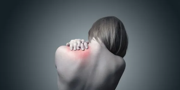 Person practicing mindful awareness to cope with chronic pain