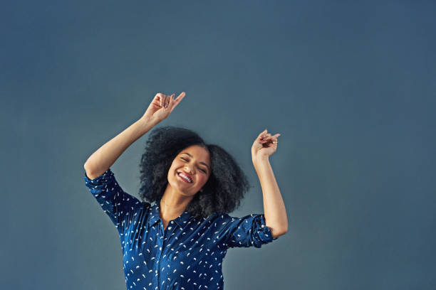Image of woman successfully overcoming stress and anxiety  istock image https://www.istockphoto.com/photos/arms-raised-celebration