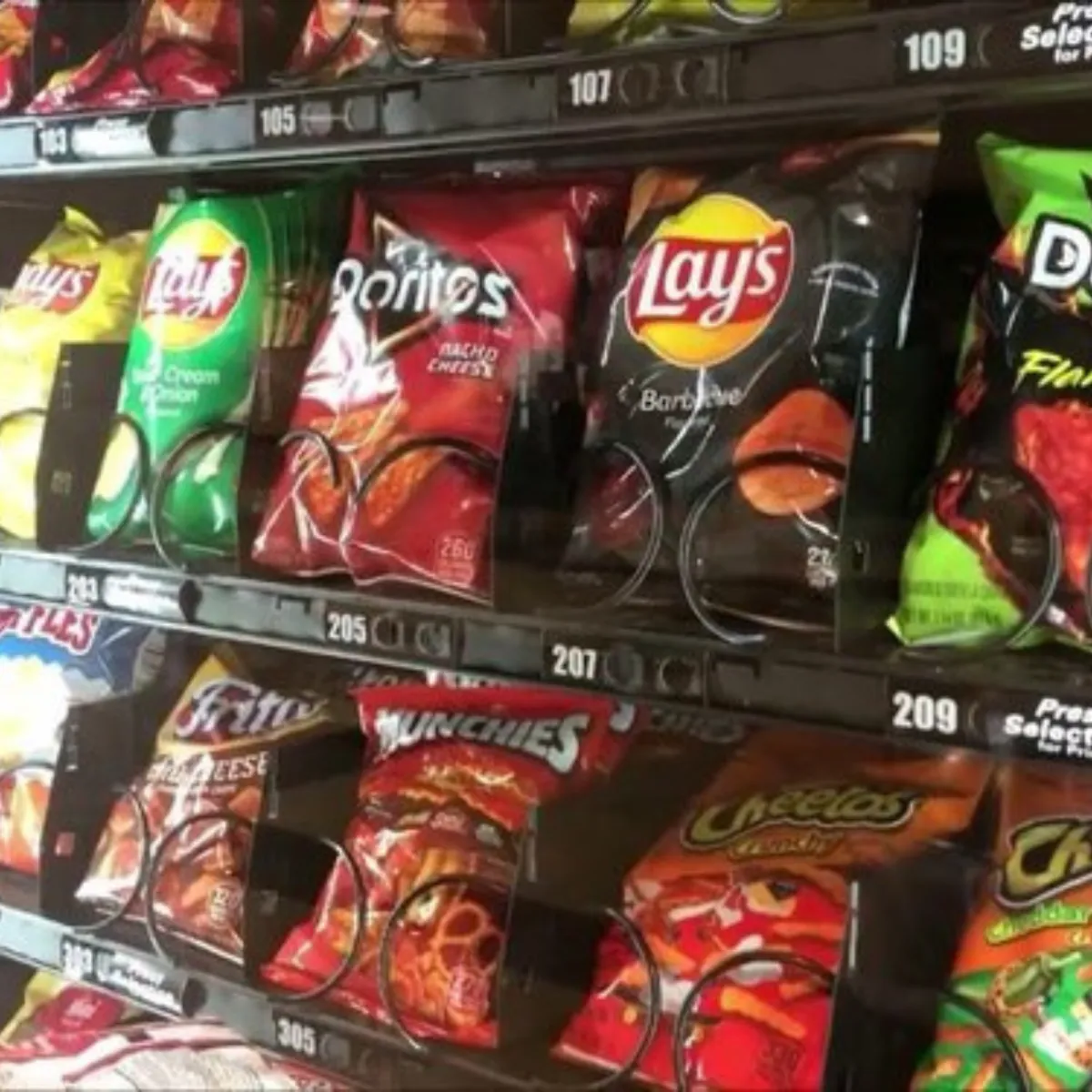 A photo of snacks in a vending machine.