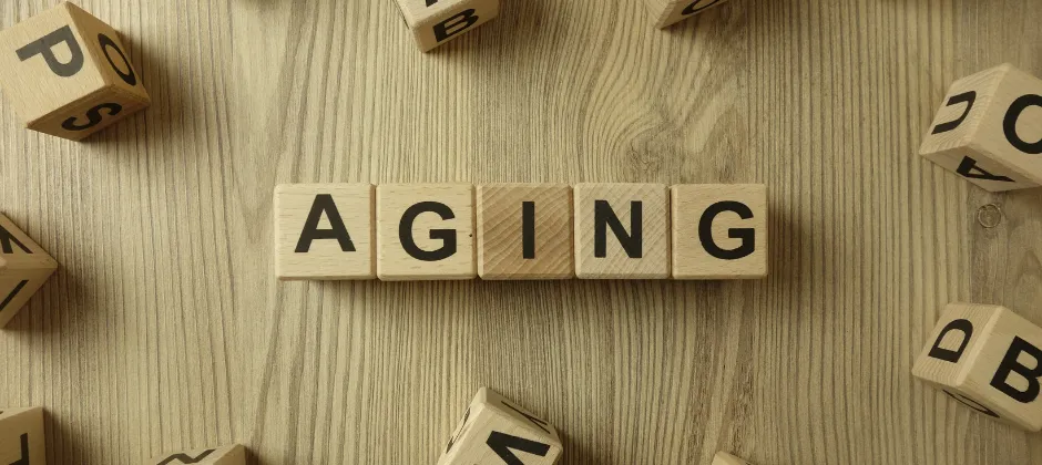 letter blocks spelling out "aging"