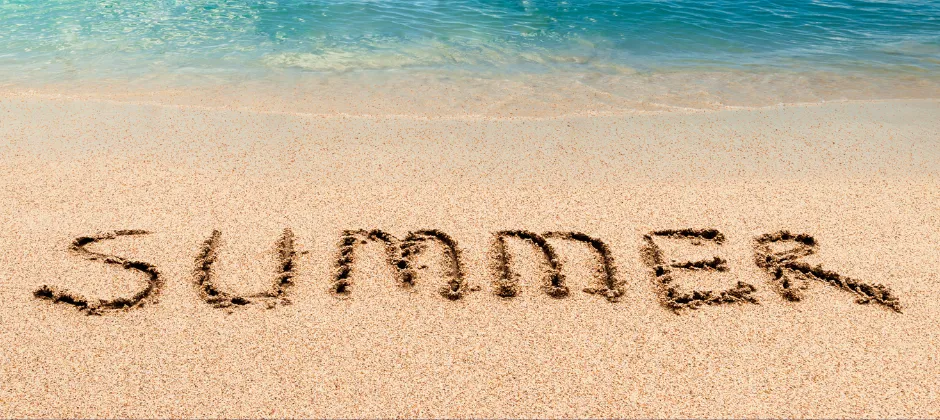 beach with "summer" written in sand