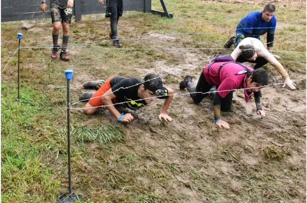 People participating in a tough mudder