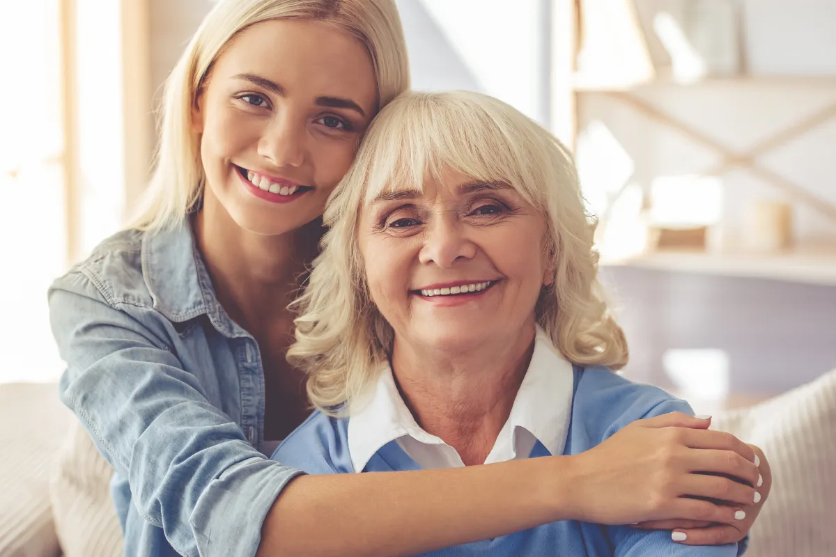Grandmother helping her granddaughter pay for medical school using home equity through a reverse mortgage line of credit.