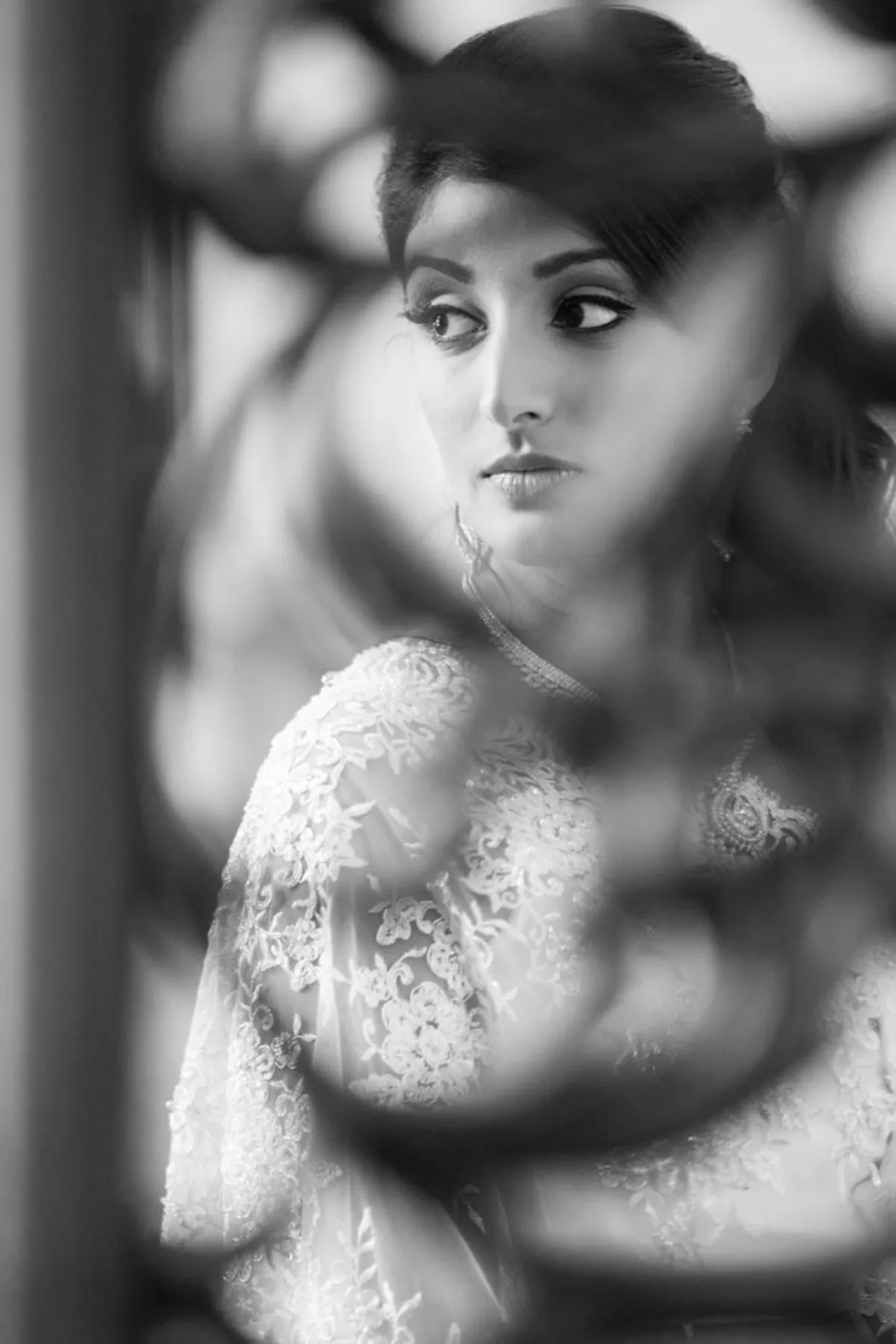 a red and purple sky with a water tower in the foreground