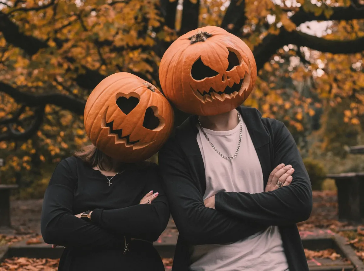 Couple with Pumpkin Heads 