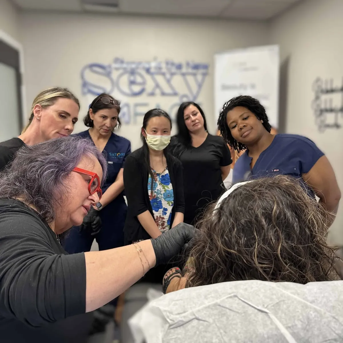 Small class session with Barbara providing hands-on instruction
