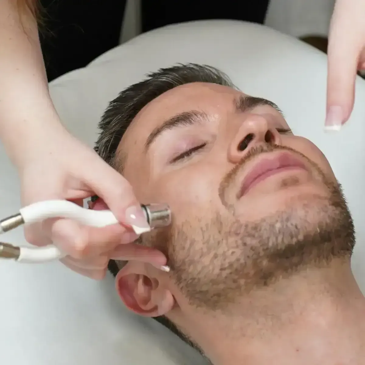 A man getting microneedling in Chrome Aesthetics