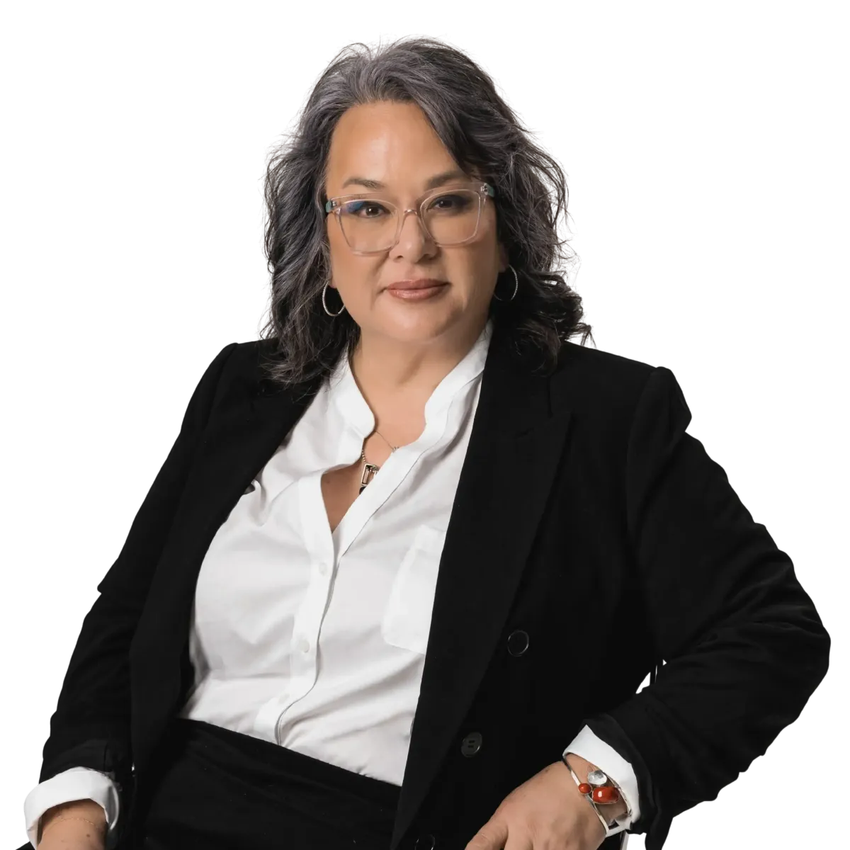 Barbara Franklin, owner of Chrome Aesthetics, seated confidently in a professional setting.