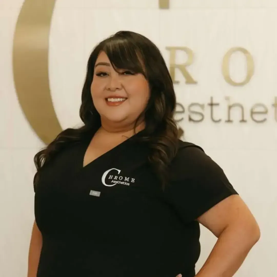 Janelle Anderson, licensed esthetician at Chrome Aesthetics, delivering professional skincare treatments.