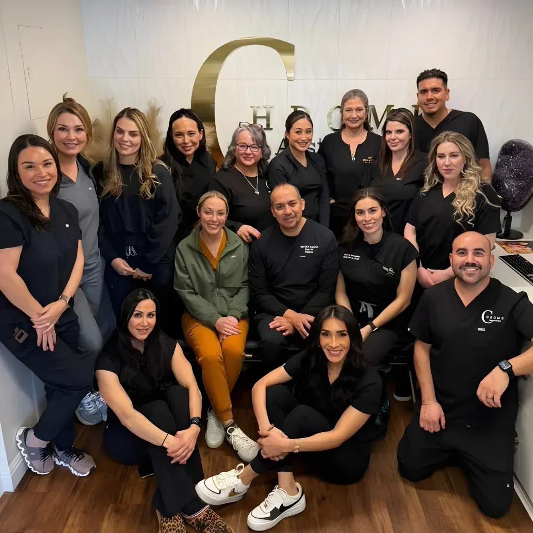Group of medical injector trainees posing together after completing the cadaver dissection training session.